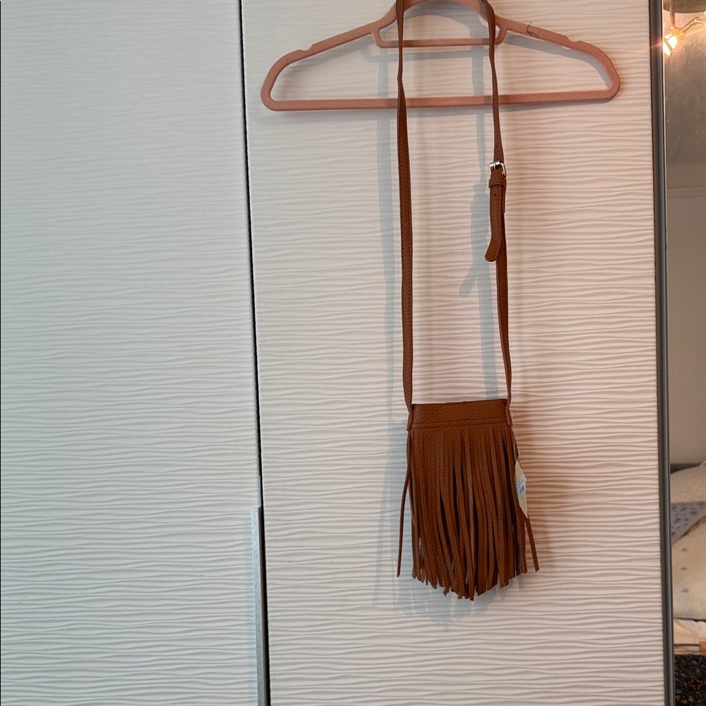 Elegant Tan Crossbody Bag with Fringe
